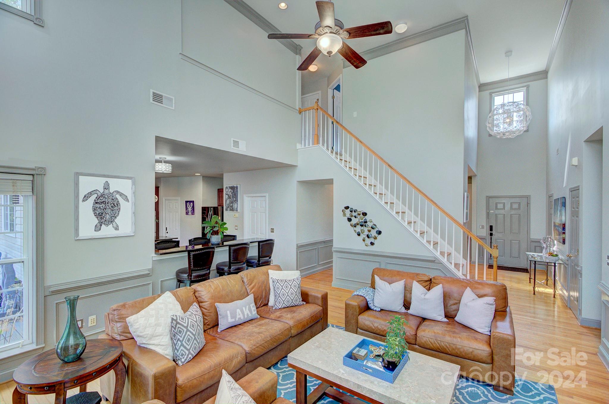 144 Lighthouse Road Mount Holly, NC 28120 - Photo 9 of 48 a living room with furniture and a dining table