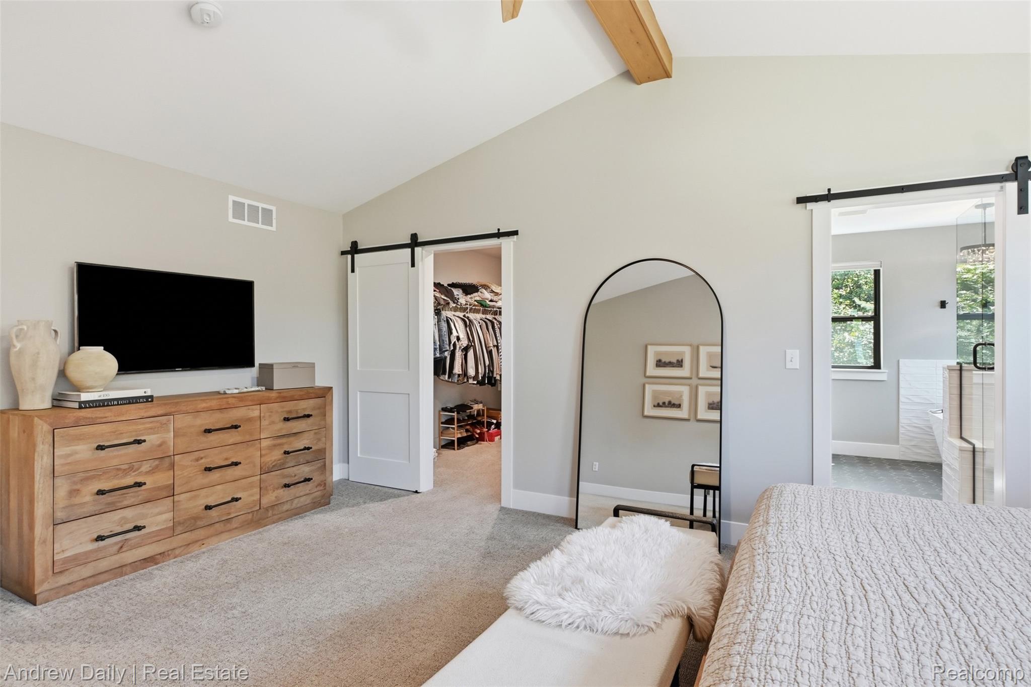 4661 Spears Road Pinckney, MI 48169 - Photo 39 of 56 Vaulted ceiling with exposed wood beam and light gray wall color