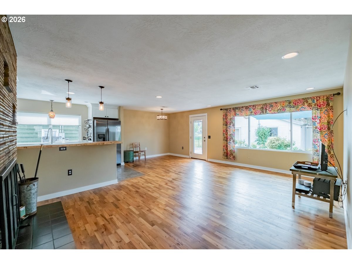 32973 Tennessee Road Southeast Lebanon, OR 97355 - Photo 13 of 36 a view of kitchen with furniture and wooden floor