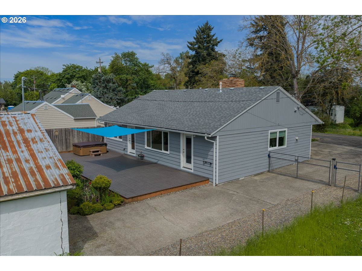 32973 Tennessee Road Southeast Lebanon, OR 97355 - Photo 25 of 36 a aerial view of a house next to a yard