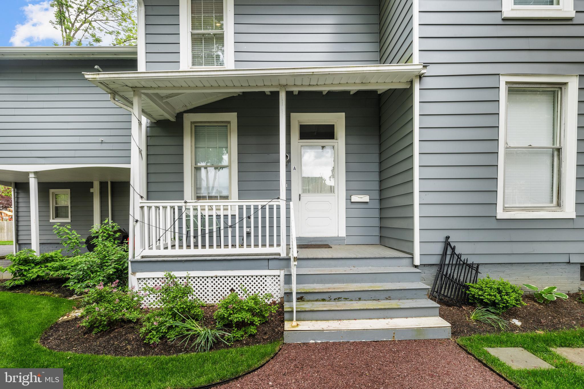 15 A Potter Street Haddonfield, NJ 08033 - Photo 9 of 11 a front view of a house with a garden