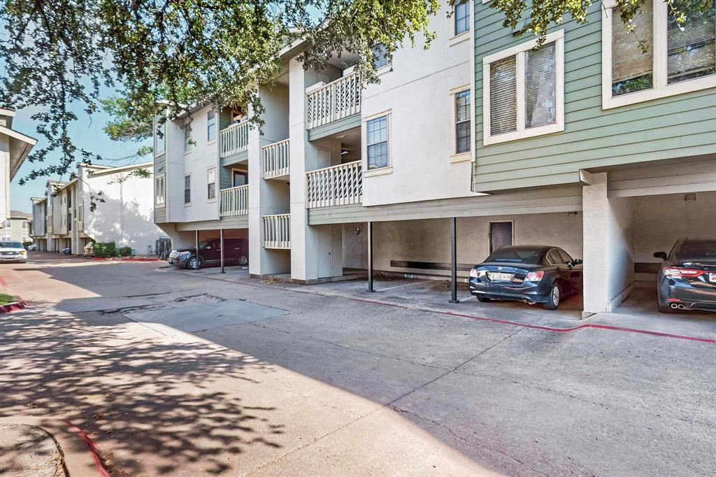 9611 Walnut Street, Unit 1105 Dallas, TX 75081 - Photo 24 of 24 a view of a car park in front of house