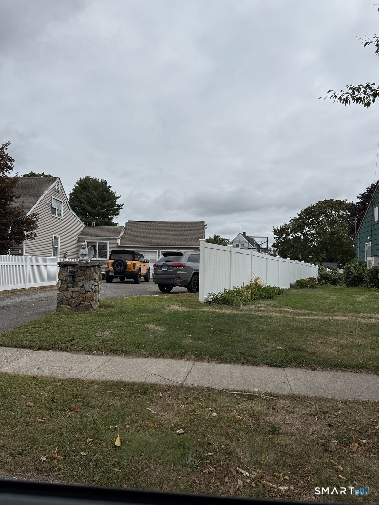 1414 Huntington Road Stratford, CT 06614 - Photo 3 of 3 a view of a town with residential houses