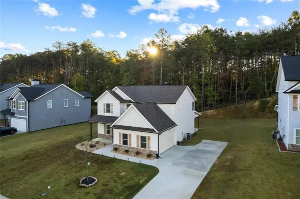 a view of a house with a big yard