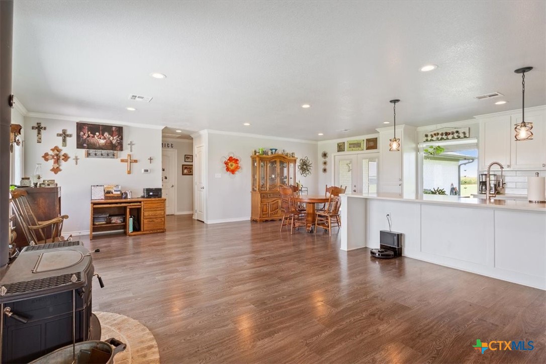 17179 Cyclone Road Burlington, TX 76519 - Photo 13 of 39 a living room with furniture and a flat screen tv