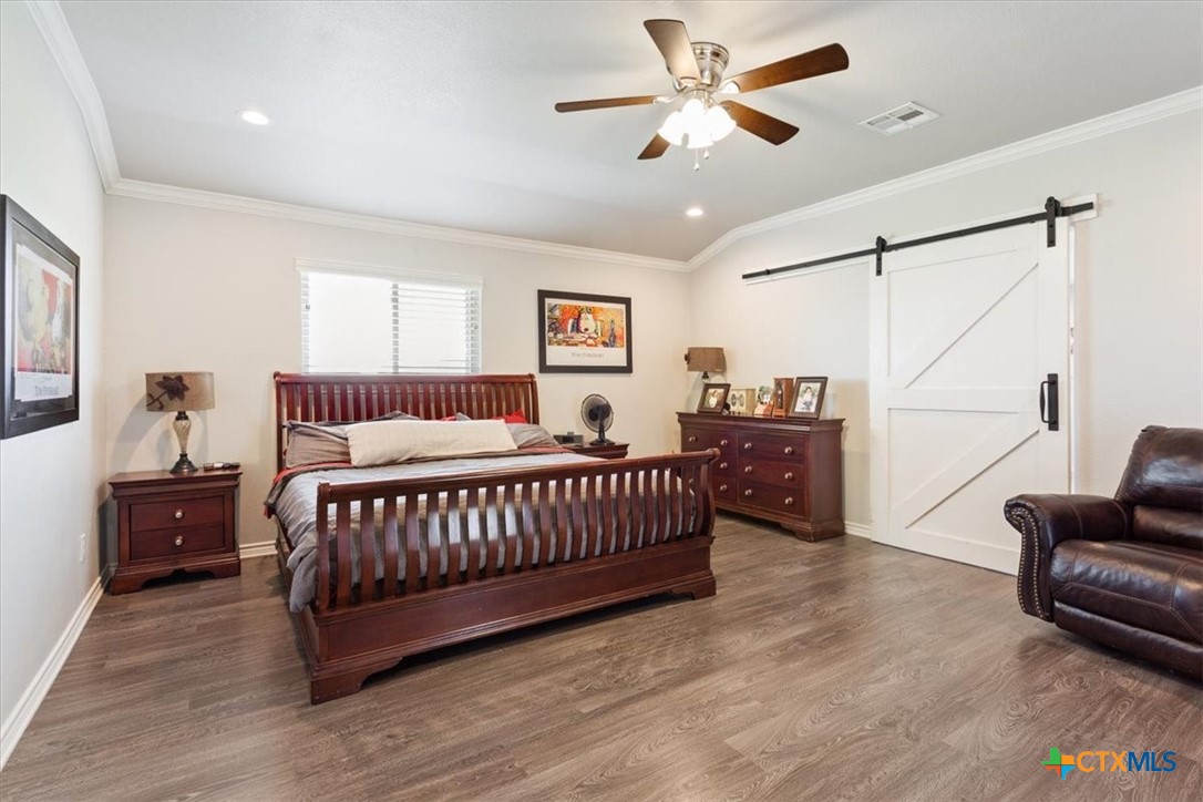 17179 Cyclone Road Burlington, TX 76519 - Photo 17 of 39 a bedroom with furniture and a window