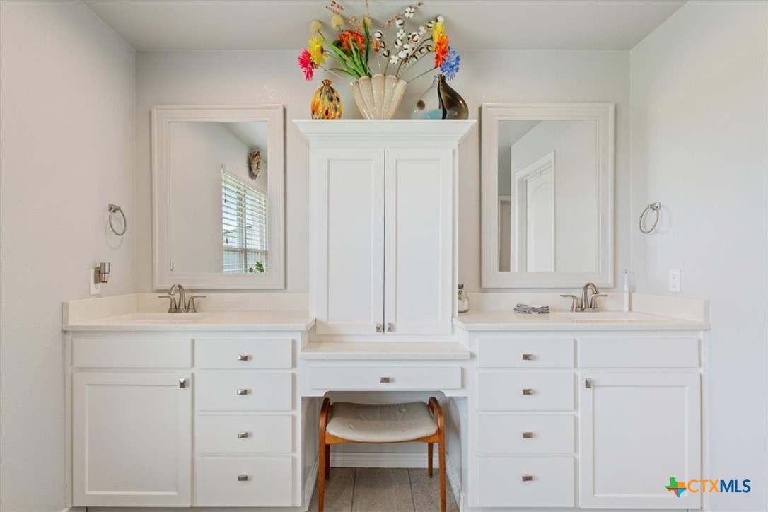 17179 Cyclone Road Burlington, TX 76519 - Photo 18 of 39 a bathroom with a sink and a mirror