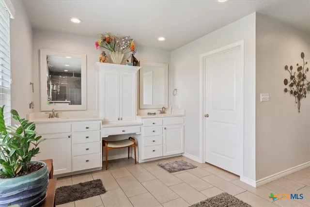 a view of cabinets and window