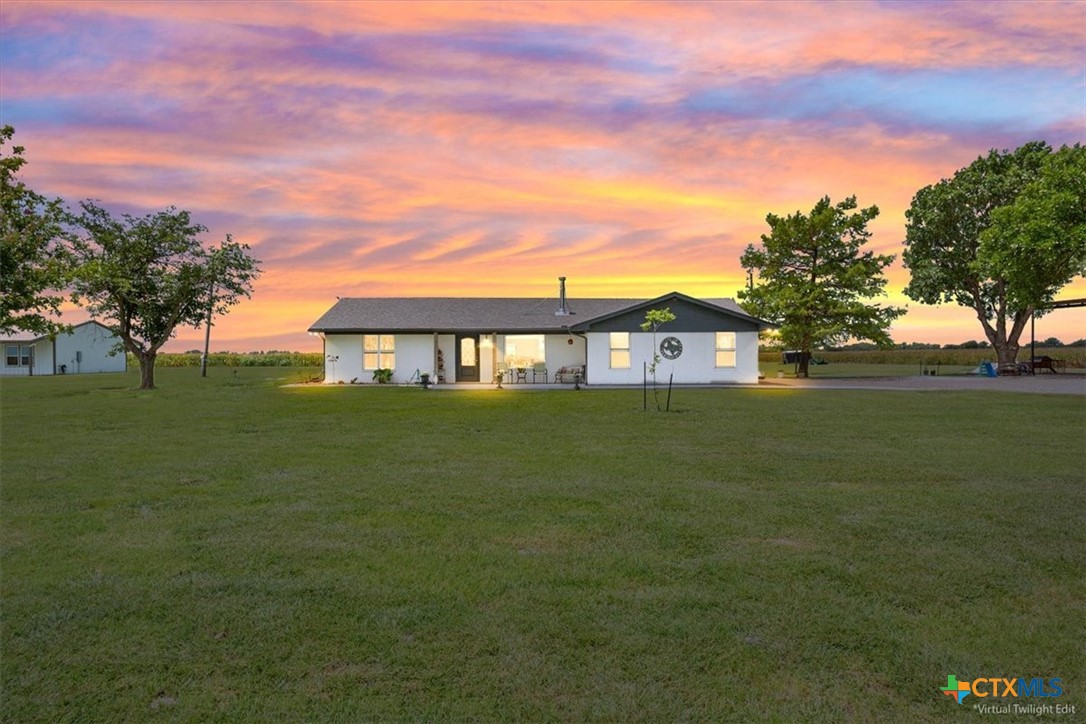 17179 Cyclone Road Burlington, TX 76519 - Photo 2 of 39 a front view of a house with a yard