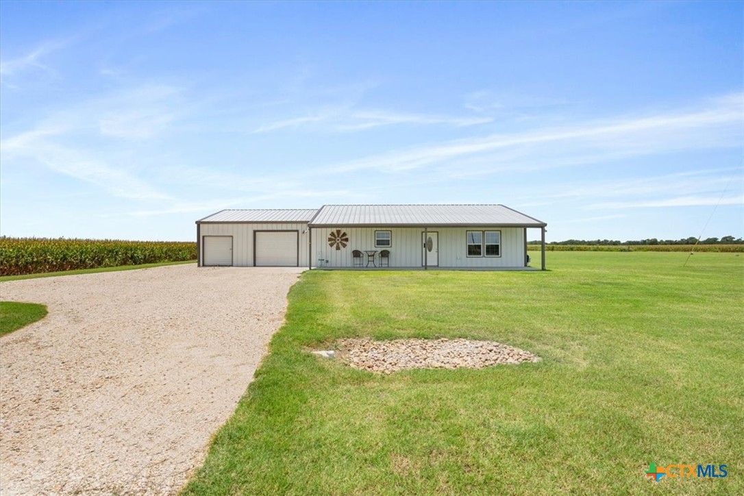17179 Cyclone Road Burlington, TX 76519 - Photo 27 of 39 a front view of a house with garden