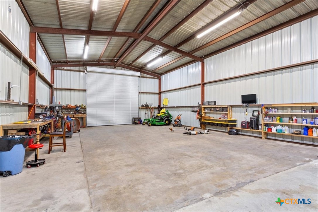 17179 Cyclone Road Burlington, TX 76519 - Photo 37 of 39 a view of a garage with storage