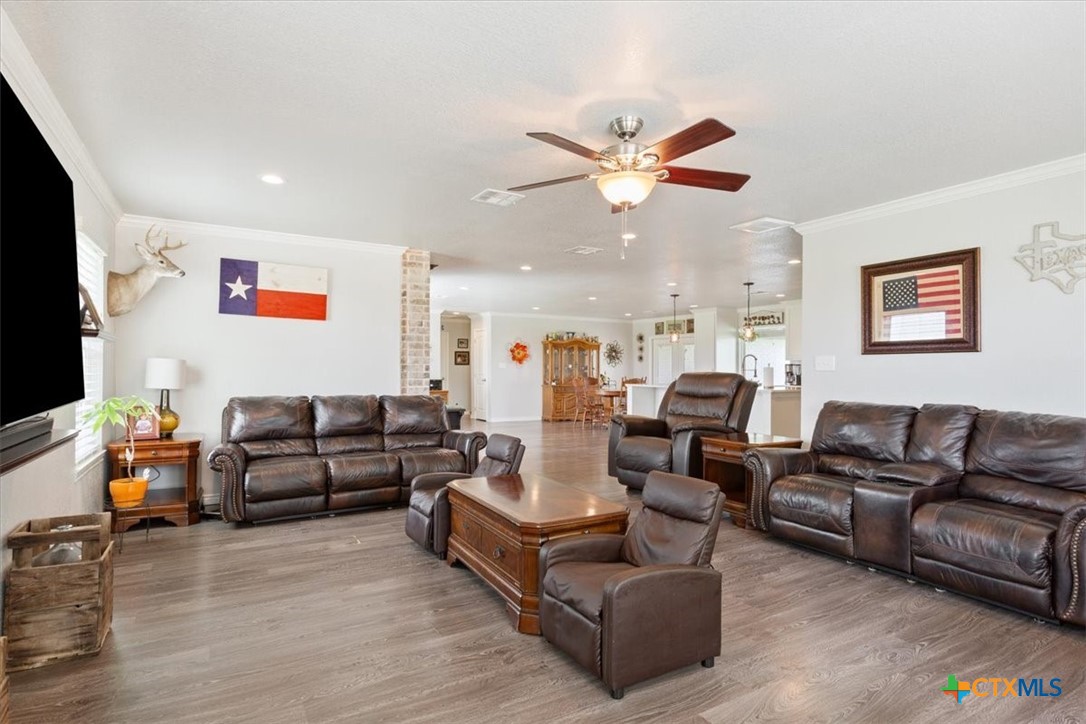 17179 Cyclone Road Burlington, TX 76519 - Photo 10 of 39 a living room with furniture and a flat screen tv