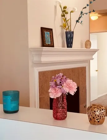 a vase of flowers sitting on a table