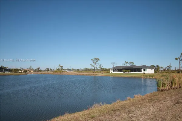 a view of a lake with houses