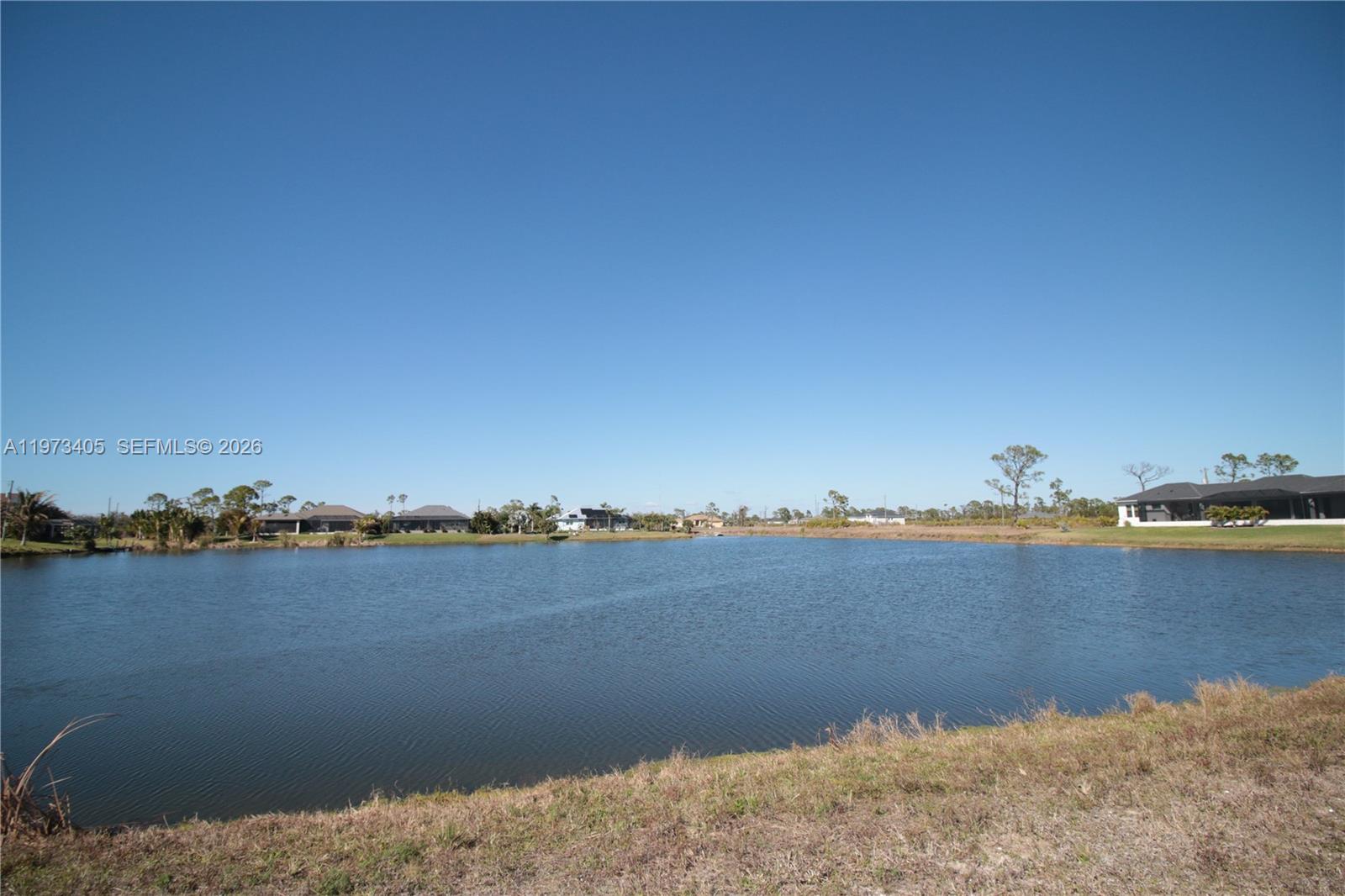 28 Harness Road Placida, FL 33946 - Photo 9 of 22 a view of a lake and city view