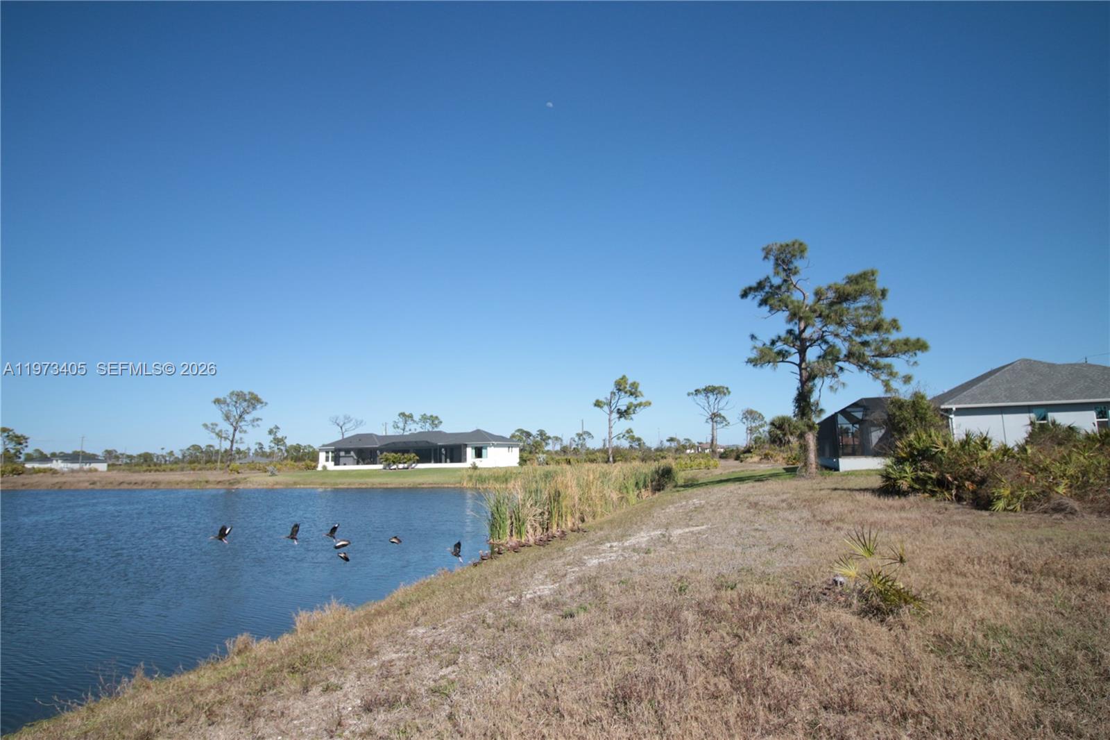 28 Harness Road Placida, FL 33946 - Photo 10 of 22 a view of a terrace with chairs