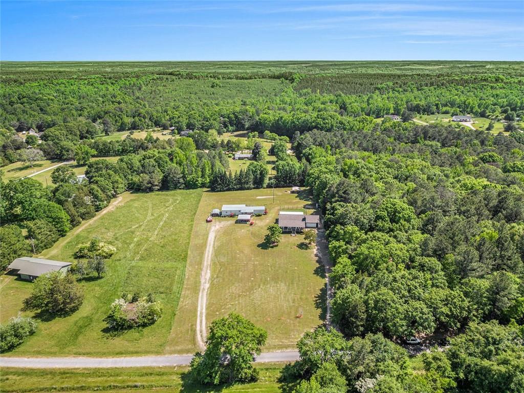 90 Old Farm Road Lexington, GA 30648 - Photo 1 of 1 an aerial view of a house with a yard