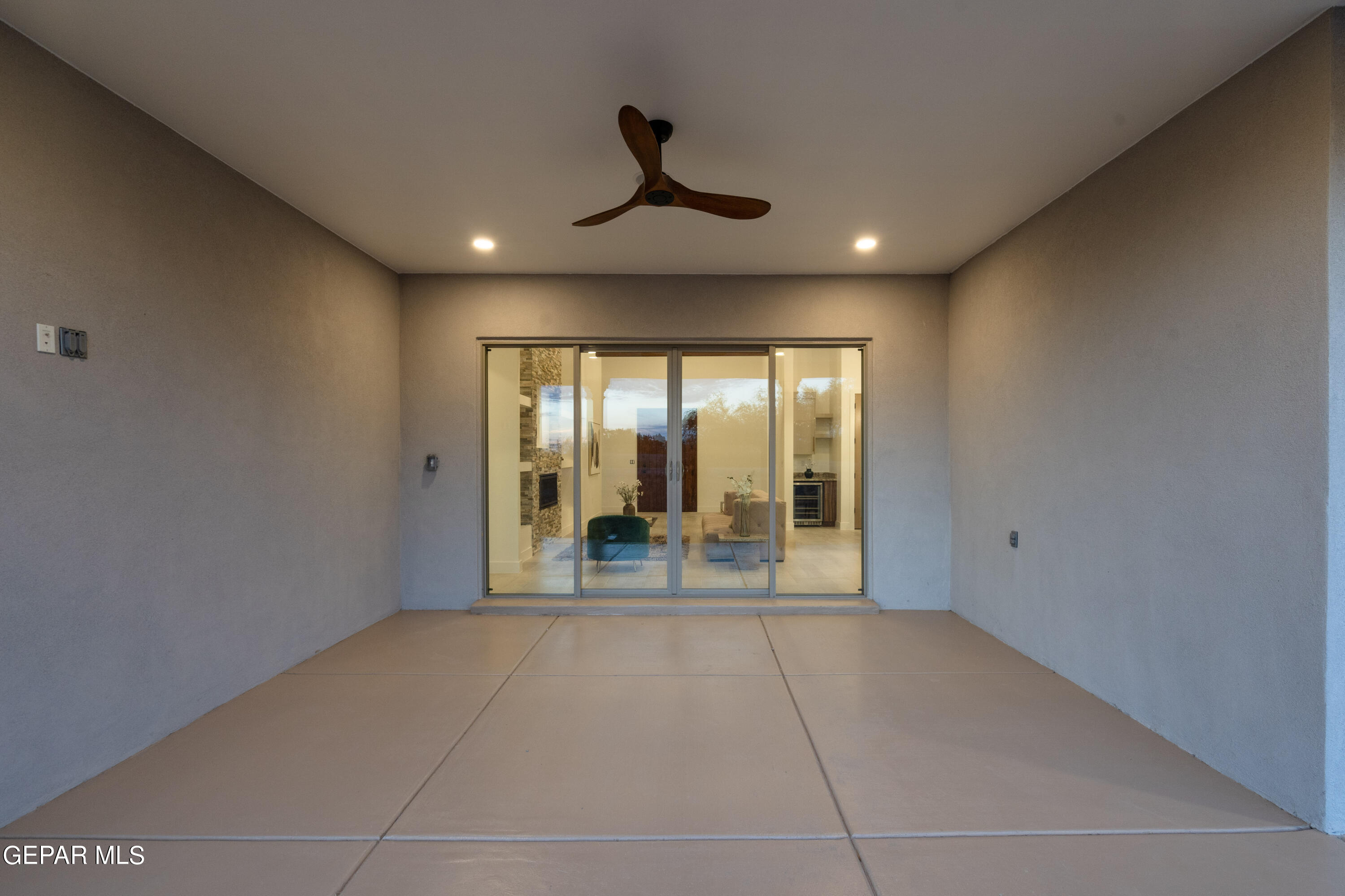 5692 Rio Bonito Circle El Paso, TX 79932 - Photo 41 of 46 a view of an empty room with wooden floor and a window