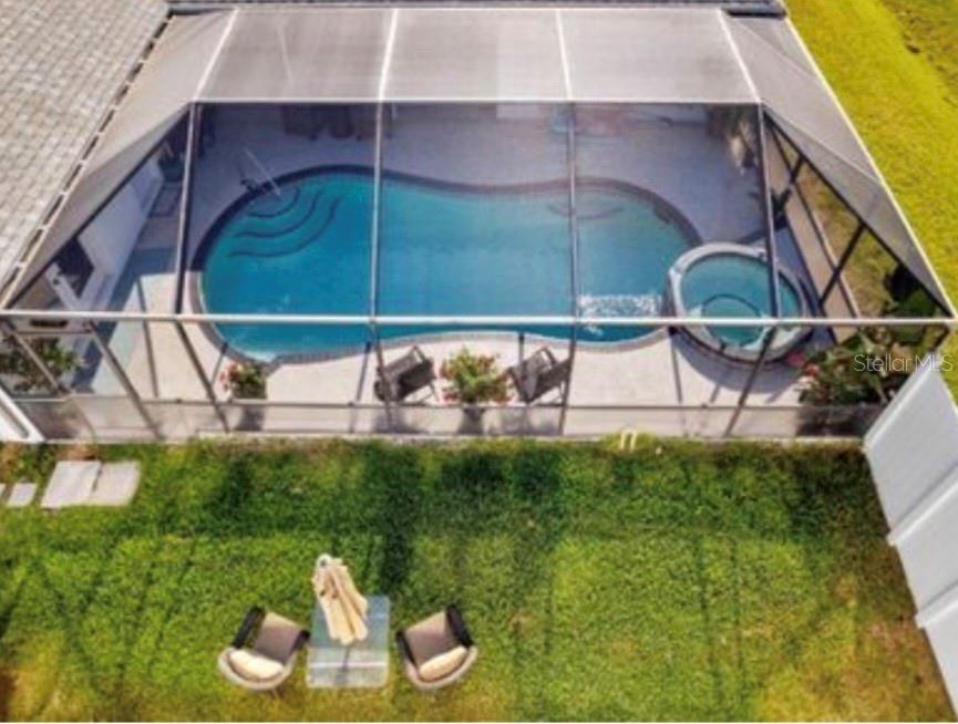 5807 Garfield Road Venice, FL 34293 - Photo 33 of 40 a view of a balcony with chairs