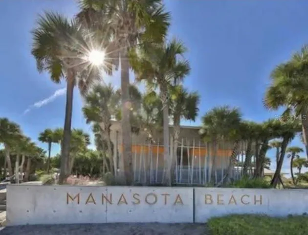 a view of a street with a building in the background