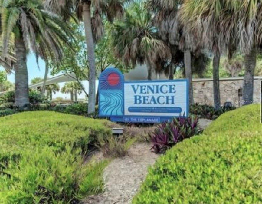 5807 Garfield Road Venice, FL 34293 - Photo 36 of 40 a sign that is sitting in front of a house with a tree