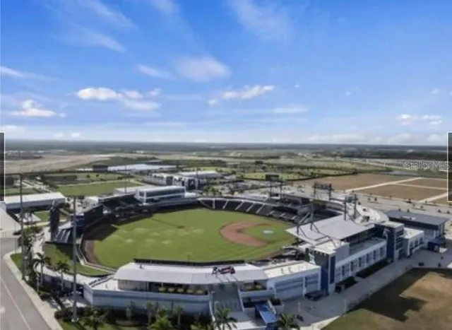 a view of a city with lawn chairs