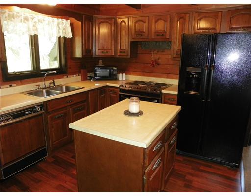 216 Hellein School Road Acme, PA 15610 - Photo 8 of 18 Kitchen. This kitchen comes with all the tools to make your favorite meal. The electric stove, refrigerator, and dishwasher are all included.