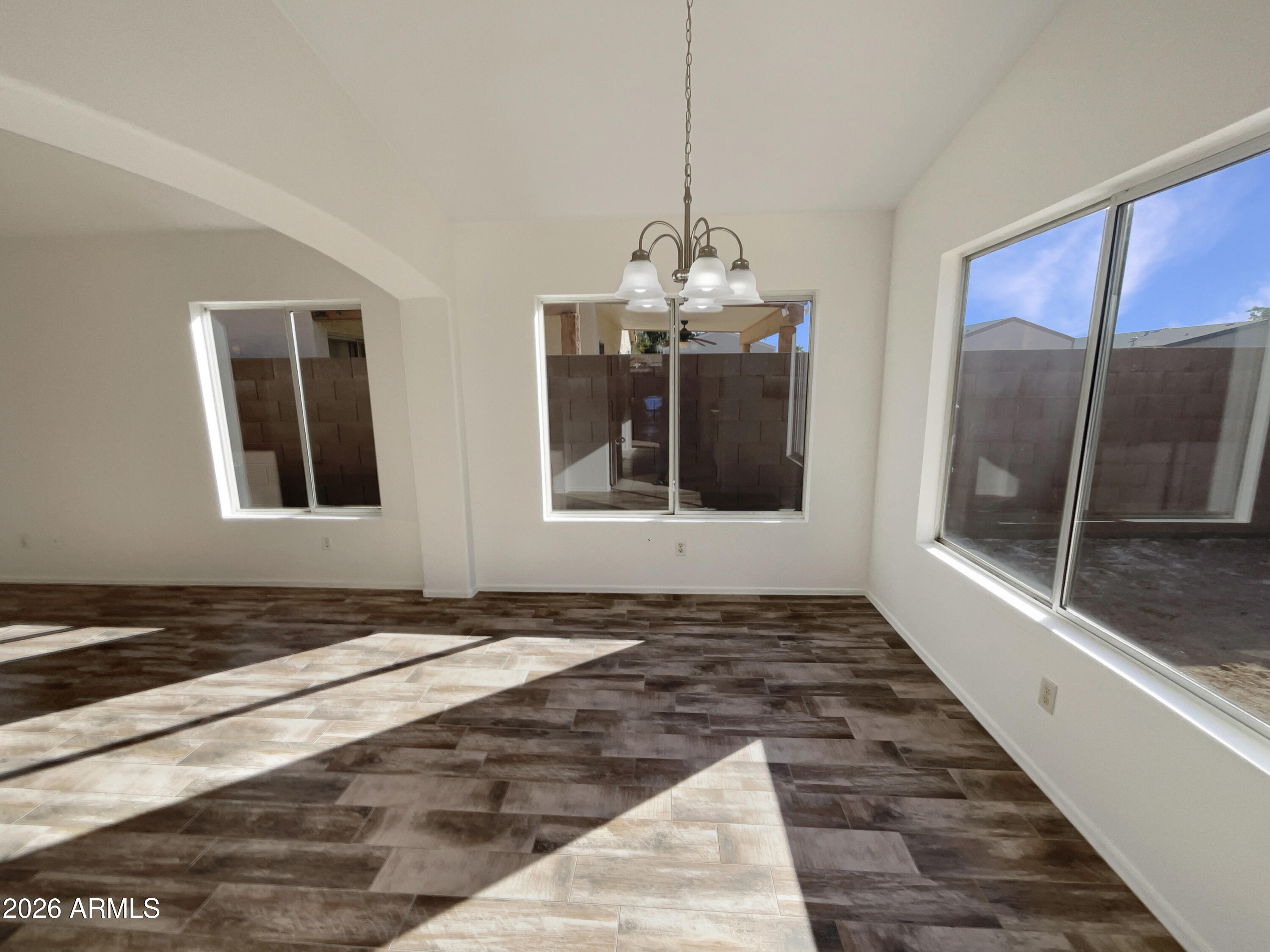 2023 East Wagoner Road Phoenix, AZ 85022 - Photo 19 of 22 a view of an empty room with a window