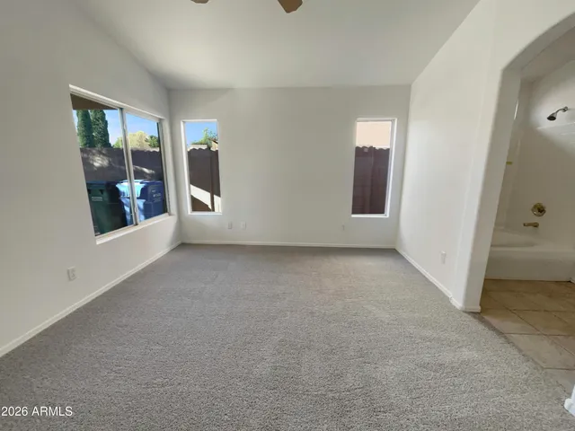 an empty room with windows