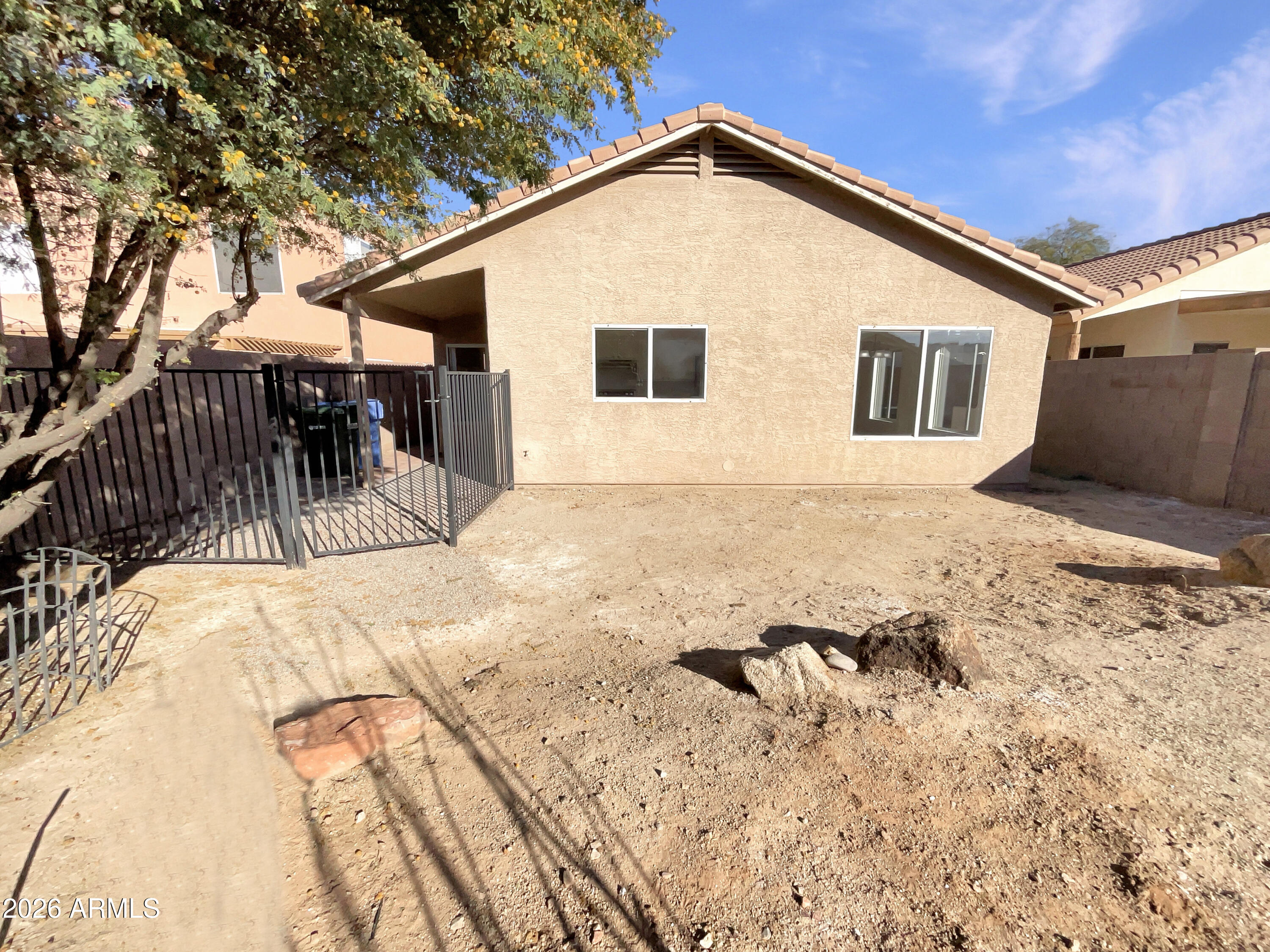 2023 East Wagoner Road Phoenix, AZ 85022 - Photo 5 of 22 a view of a house with a yard