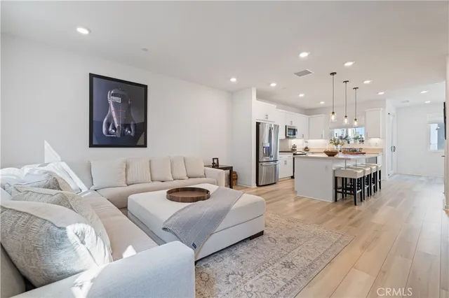 a bedroom with a bed and a table