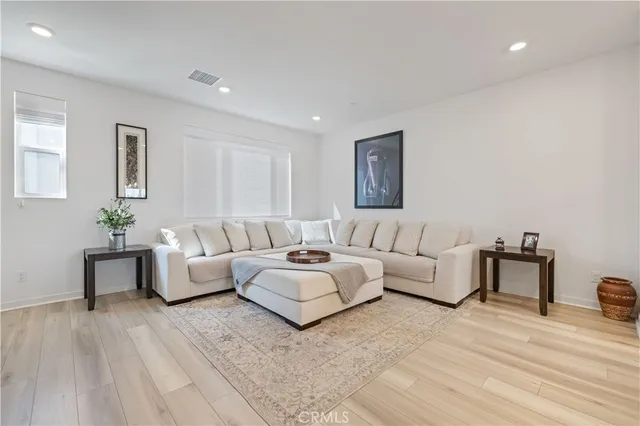 a bedroom with a bed and a view of bathroom