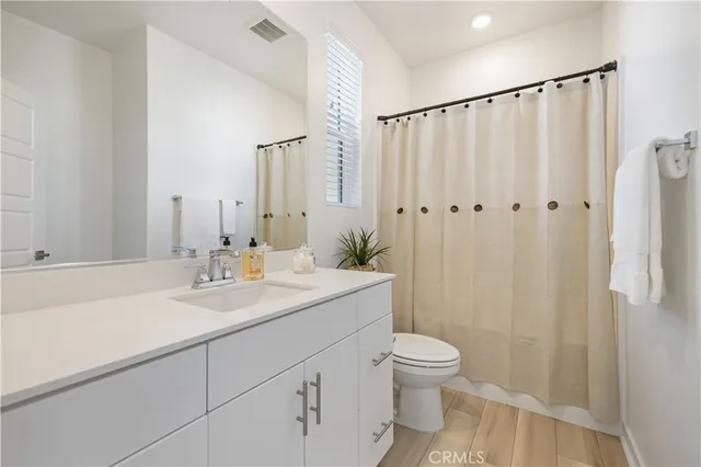 a large white building with a view of city