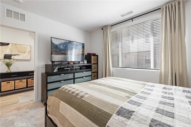 an aerial view of a city with lots of residential buildings