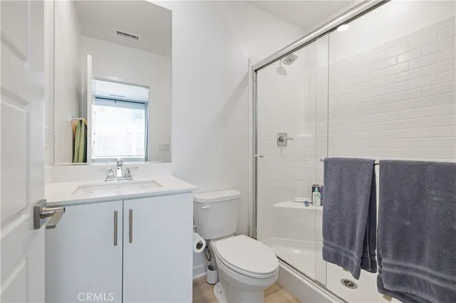 a view of a city with lawn chairs