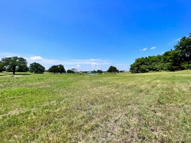 a view of building with yard
