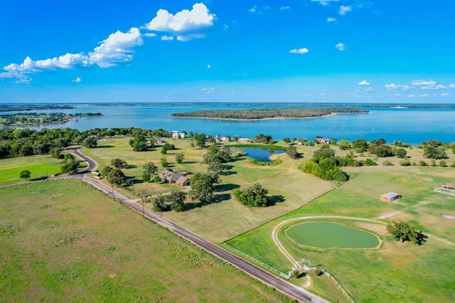 a view of an ocean yard and outdoor seating
