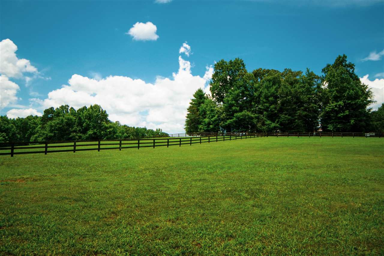 3006 George Hopkins Road Bahama, NC 27503 - Photo 21 of 25 Overlooking the Pasture from the Barn
