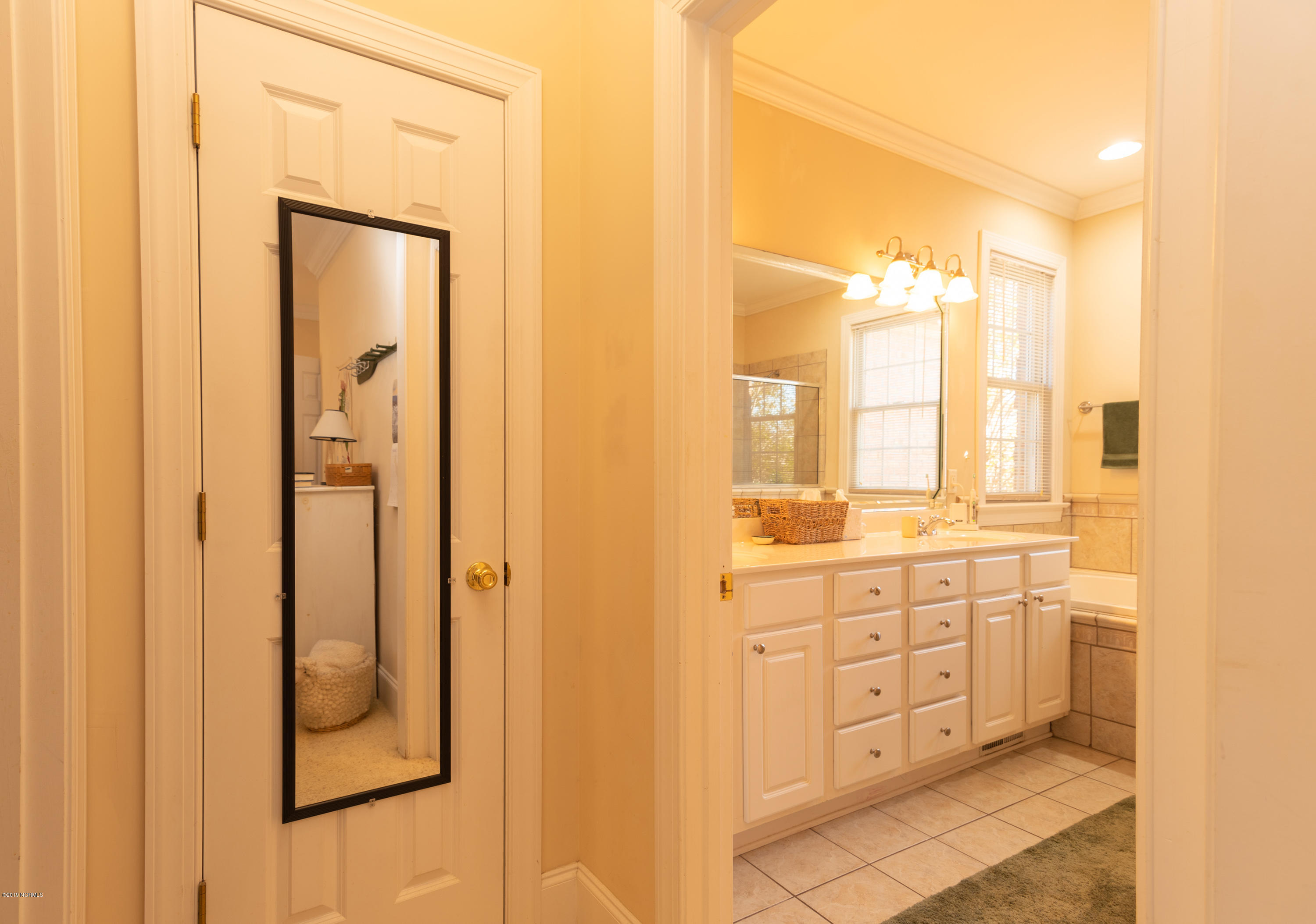 126 Mellen Road New Bern, NC 28562 - Photo 22 of 58 Linen Closet & Master Bath