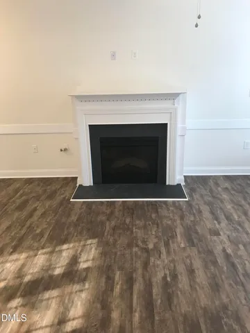a living room with a fireplace