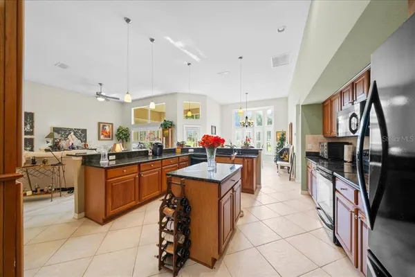a kitchen with stainless steel appliances lots of counter top space