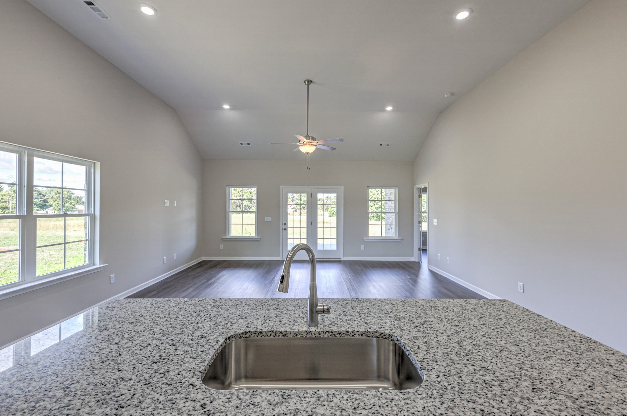 41 Bartow Street Decherd, TN 37324 - Photo 16 of 37 a kitchen with a sink and chandelier
