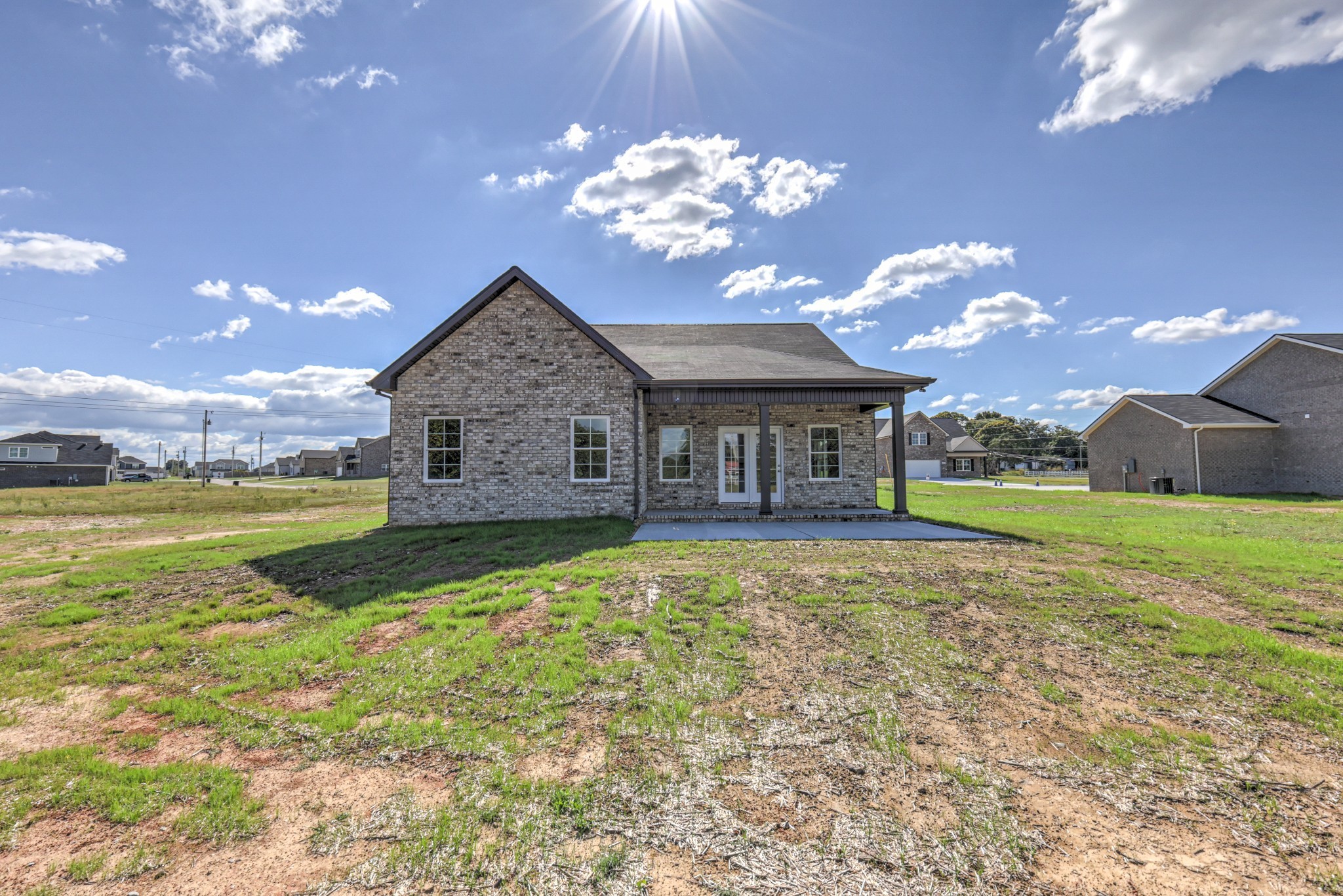 41 Bartow Street Decherd, TN 37324 - Photo 36 of 37 a view of a house with a big yard and potted plants