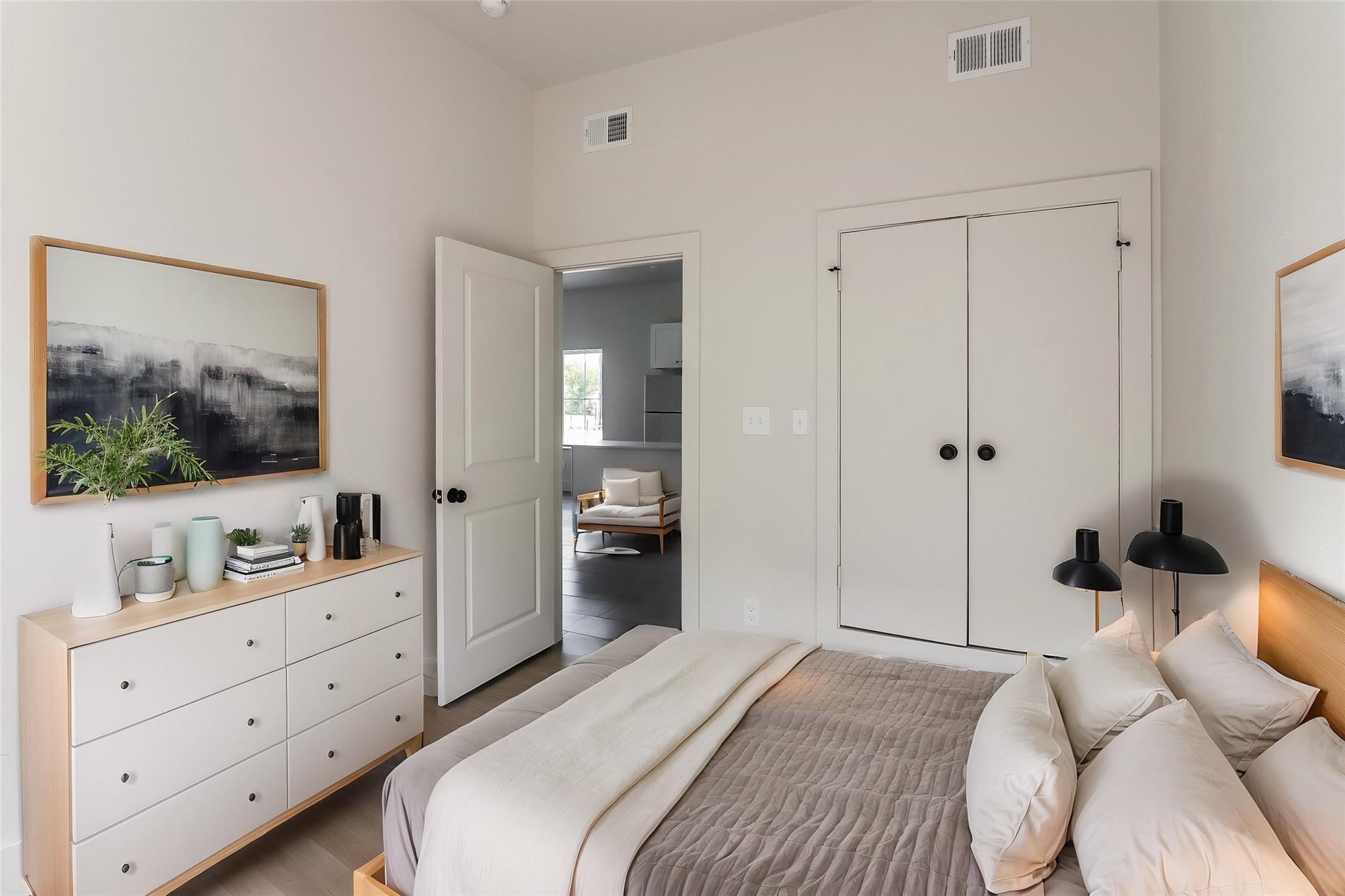 3726 Bellfort Avenue, Unit F3 Houston, TX 77051 - Photo 10 of 13 a bedroom with a bed and a flat screen tv