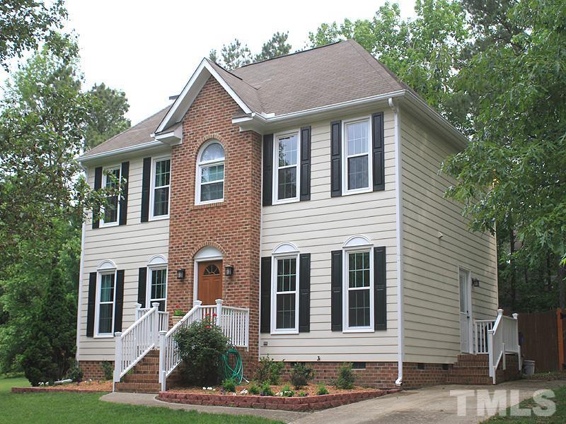 3601 Hopper Street Raleigh, NC 27616 - Photo 1 of 13 a front view of a house with garden