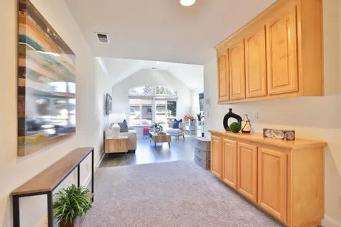 a very nice looking living room with a large window