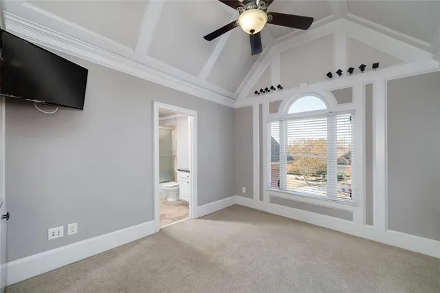 a living room with fireplace furniture and a flat screen tv
