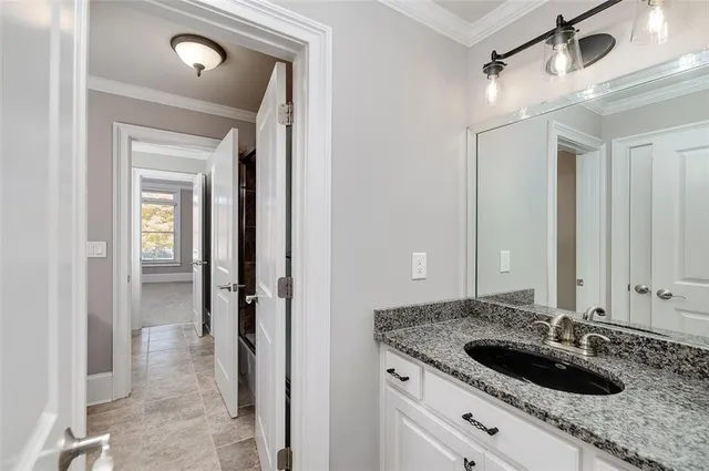 a view of a livingroom with furniture and windows