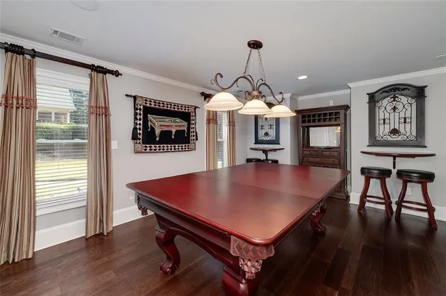 a view of balcony with couch and wooden fence