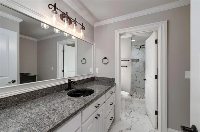 an aerial view of a house with a swimming pool